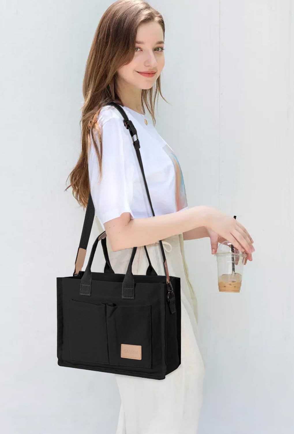Canvas tote bag in neutral color with multiple pockets and top handles — view 3