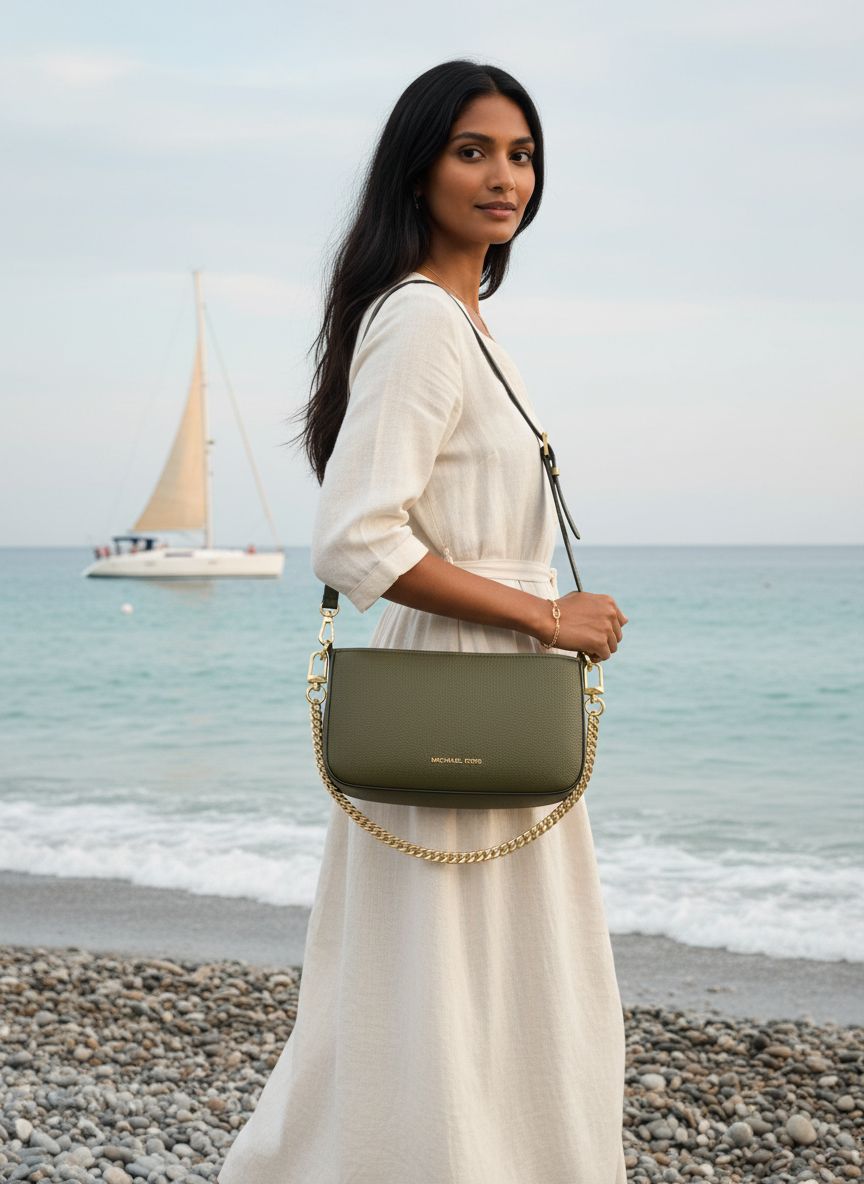 Leather convertible crossbody bag in neutral color, front view with chain strap — view 3a