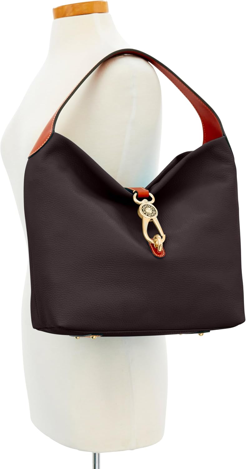 Dooney & Bourke pebble grain leather shoulder bag with logo lock in neutral color, shown with matching coin purse — detail