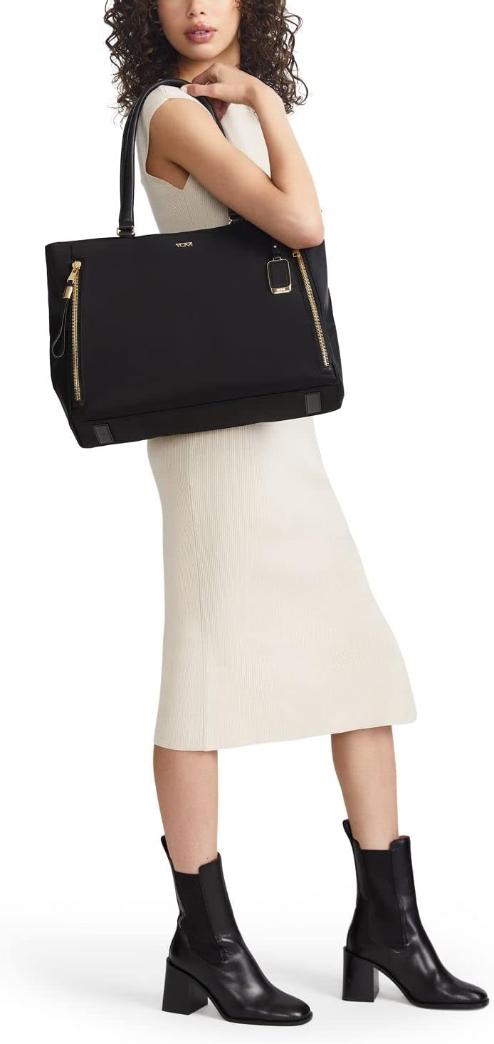 Lightweight nylon tote bag in neutral color, minimalist design for work and travel — side