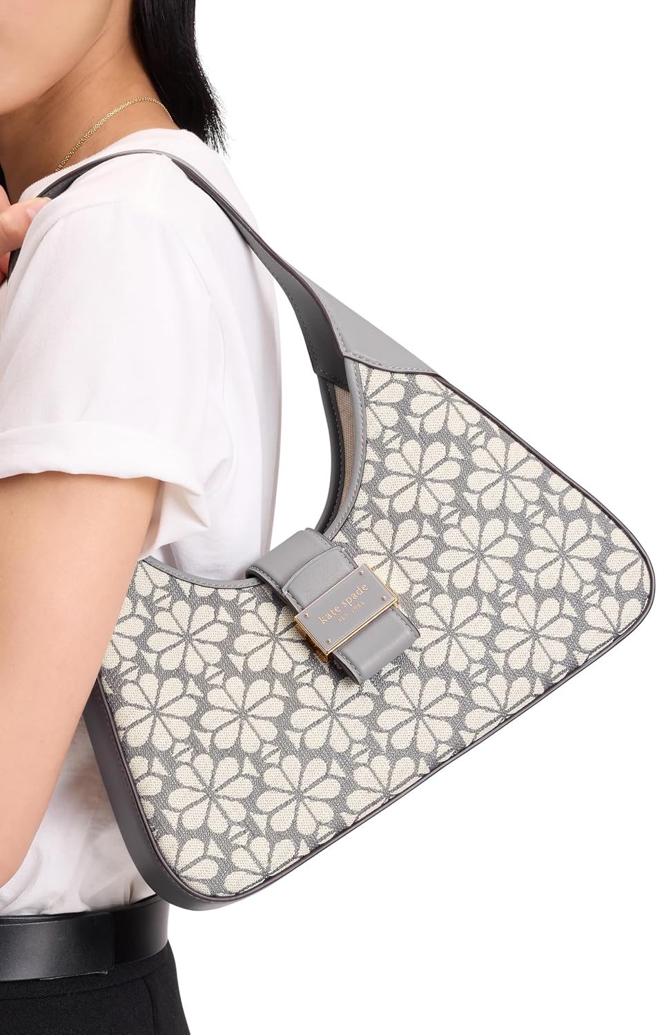 Classic leather shoulder bag in neutral tone, compact underarm style — detail